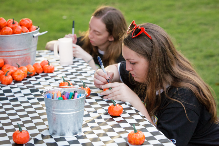 Students Painting Pumpkins